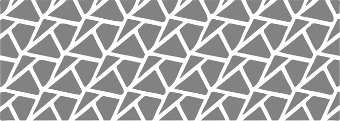 Abstract broken tile design in grayscale with irregular polygon shapes.