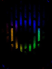 A moody abstract image featuring a dark grid of vertical dot bars illuminated from behind with a...