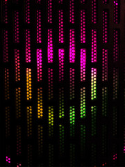 A moody abstract image featuring a dark grid of vertical dot bars illuminated from behind with a...