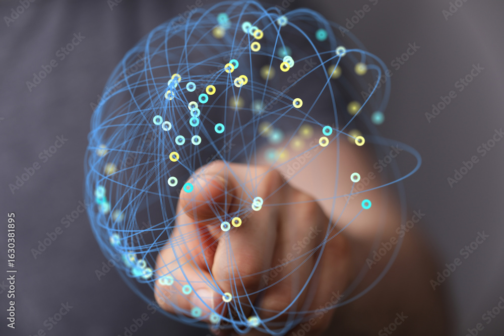 Poster abstract image depicting a hand interacting with a digital network sphere. represents global connect