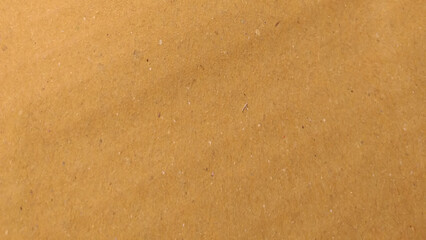 Brown blank paper texture background macro close up view, grain paper texture, dots, speckles, specks, flecks and particles. 