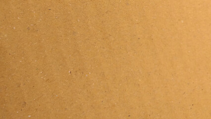 Brown color paper shown grain details on  it surface. Vector cardboard realistic background. Texture of kraft paper.