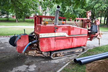 Directional drill machine or Drilling rig stands on paved asphalt. Horizontal directional drilling...
