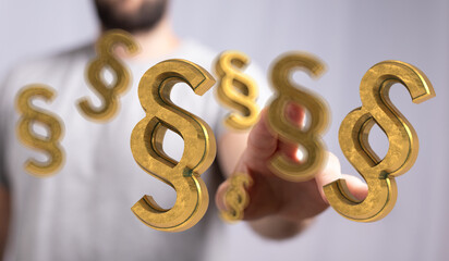 Abstract image of golden paragraph symbols floating near a hand, representing law, legal, and...