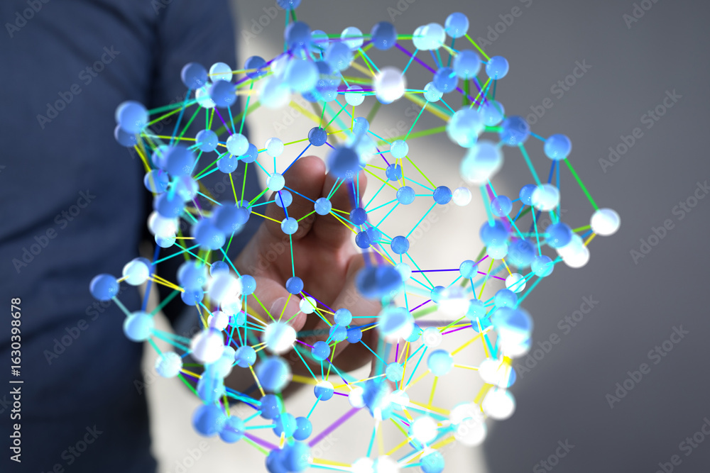 Poster abstract image of a hand holding a network of interconnected nodes, representing global communicatio