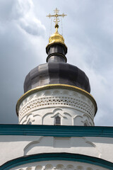 The dome of the ancient Cathedral of the Three Saints the Great in close-up. The Spaso-Eleazarovsky...