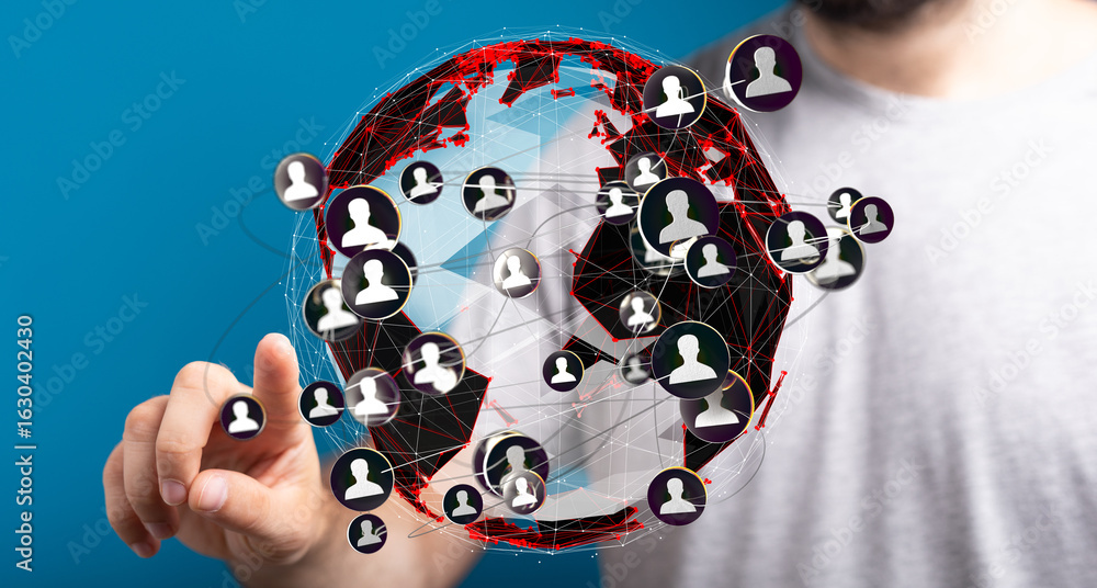 Poster person interacting with a digital globe showing global network connections and user profiles.