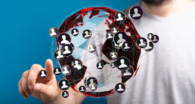 Person interacting with a digital globe showing global network connections and user profiles.