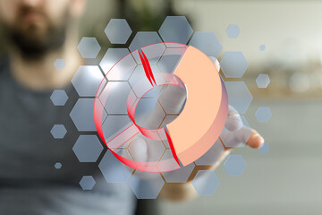 Person interacts with a 3D pie chart on a screen. Data analysis concept.