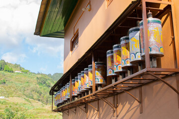 Prayer wheels, or mani wheels, cylindrical wheels for Buddhist recitation. Traditionally, a mantra...