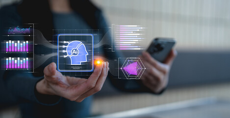 A person interacts with a smartphone, displaying digital graphics related to artificial intelligence and data analysis.