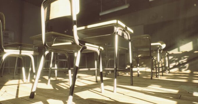 Sunlight streams through the windows of an empty classroom, casting shadows on wooden floors. Desks and chairs stand quietly, awaiting the return of eager students.