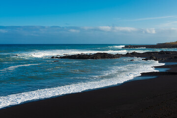  beach with black sand