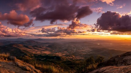 Fototapeta premium Dramatic sunset panorama from a mountain peak.