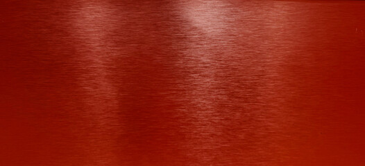 Brushed red metal texture with horizontal grain and subtle reflections, ideal for backgrounds,...