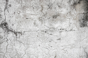 Close up of old stucco cracks on the wall, Old cracked paint on the concrete wall, Weathered paint...