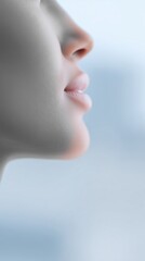 Close-up profile of a woman with smooth skin and soft lips, showcasing delicate facial features against a blurred background, emphasizing beauty and elegance in a serene atmosphere