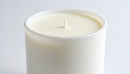 White Cylindrical Candle With Soft Light