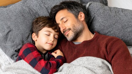 A father and son sharing a peaceful moment while sleeping together on a couch