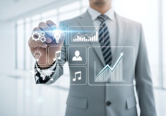 Businessman interacting with futuristic holographic interface displaying charts and icons