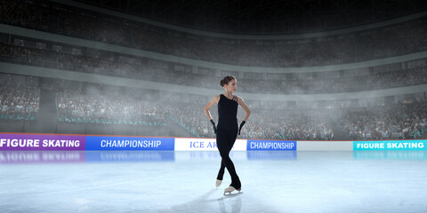 Figure skater girl skating on ice stadium.