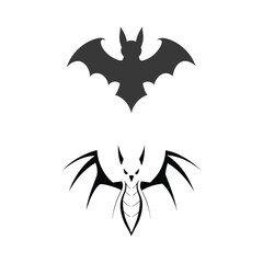 Two stylized bat silhouettes one dark grey and one black