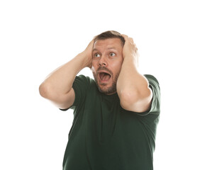 Man suffering from panic attack on white background