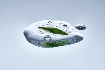A drop of face serum or mint leaf gel.