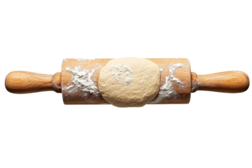 Dough and rolling pin on floured surface ready for baking