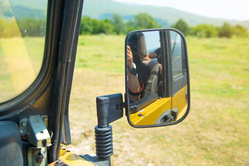 Offroad car mirror in the outdoors.