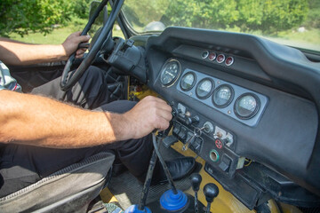 Man driving off road 4x4 car.