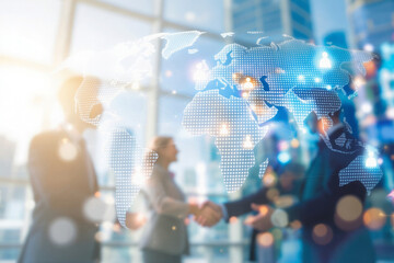 Global business partnership handshake with digital world map overlay