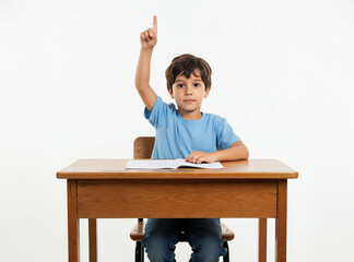 Boy raising hand to answer question in elementary school classroom