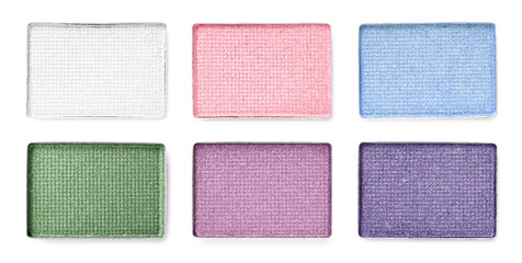 Fototapeta premium Different eyeshadow in refill pans on white background, set. Palette of shades