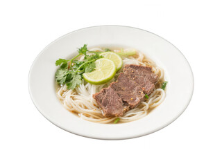 Authentic Vietnamese Pho with Beef, Herbs, and Lime on White Plate