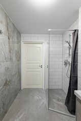 Bright Elegant Modern Minimalist Bathroom Interior Design of Shower Room With White Door