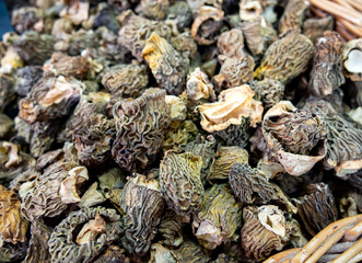 Wicker basket with dried morel mushrooms