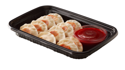 Nepalese Traditional Dish Momo. Authentic Cuisine in Nepal momo over a rustic wooden background.
Steam-cooked momos with sauce.