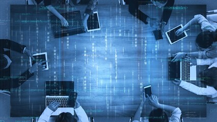 A diverse team of professionals engaged in collaboration at a digital workspace, using modern devices while surrounded by abstract technology patterns and data visualizations. Xenic