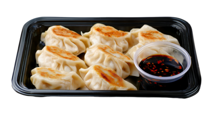 Nepalese Traditional Dish Momo. Authentic Cuisine in Nepal momo over a rustic wooden background.
Steam-cooked momos with sauce.