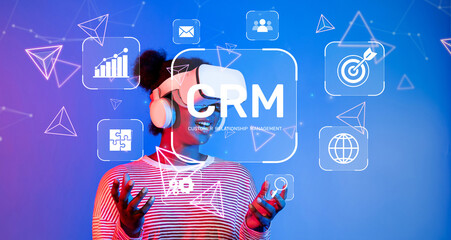 A young woman engages with virtual reality technology to explore modern customer relationship management tools and enhance digital interactions in a dynamic business environment. XDMCP