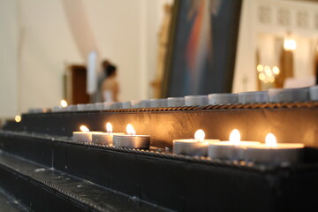 burning candles in church