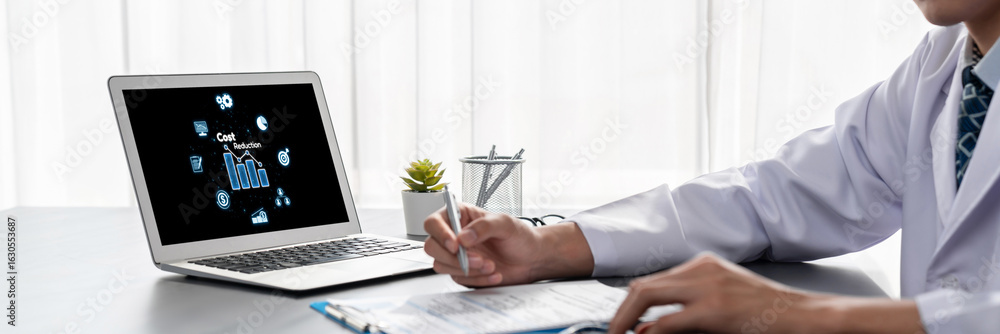 Poster cost reduction, cost saving concept shown on computer screen brisk, corporate business efficiently s