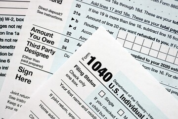1040 US individual income tax return form blank close up. Few pages of united states tax blank