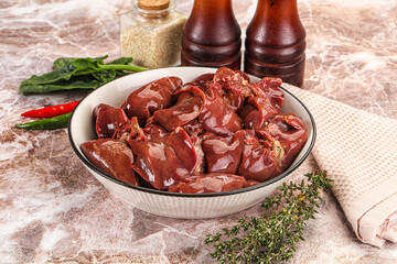 Raw uncokked chicken liver in the bowl