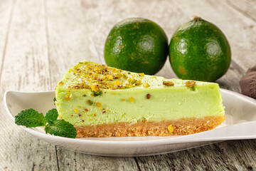 Green pistachio cheesecake served mint