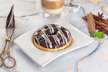 Delicous sweet donut with chocolate glaze