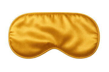 Plush golden sleep mask providing restful comfort, resting on transparent surface