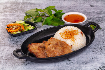 Roasted pork steak with rice