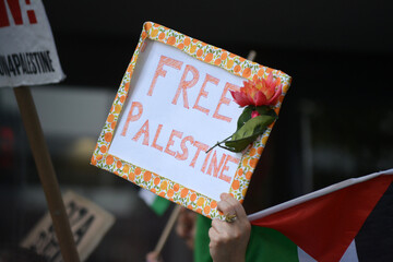 Sign at a rally calling for more humanitarian aid for Gaza.
